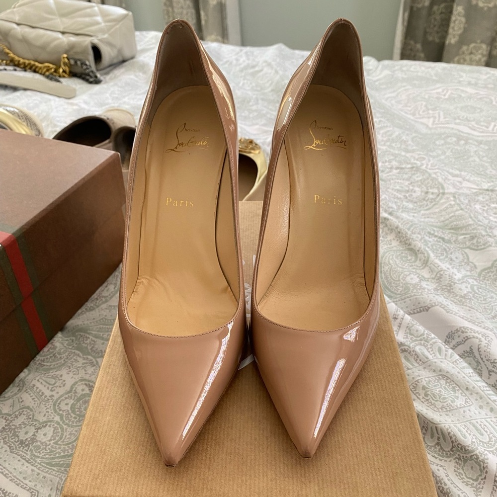 Christian Louboutin's Décolleté 554 85mm patent-leather pumps
